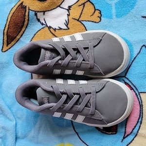 Kids Adidas gray pull on sneaker, gently worn, minor scuff on front of shoe.